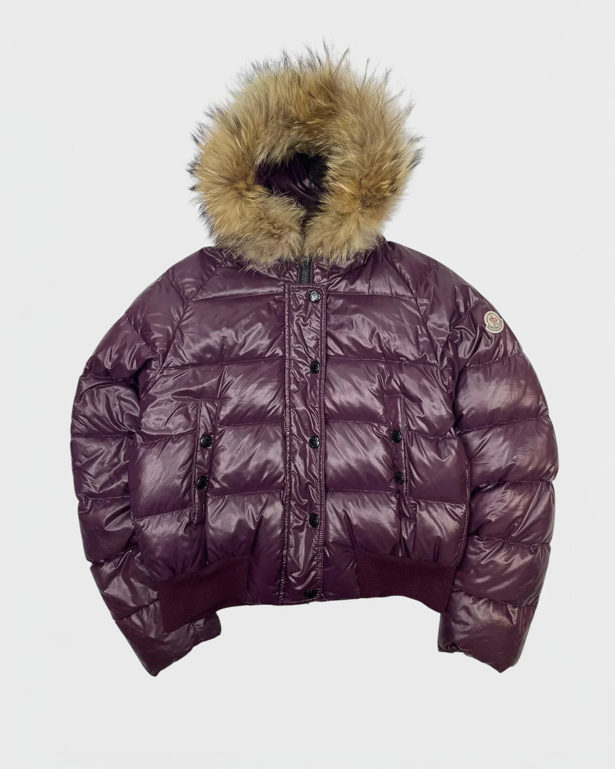 Chaqueta de plumas Moncler con capucha de piel