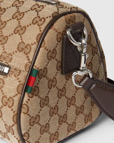 Bolso cilíndrico pequeño de lona GG