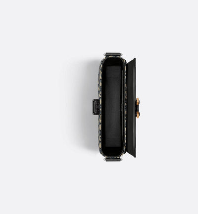 Bolso bandolera pequeño con solapa en color negro y beige de Saddle