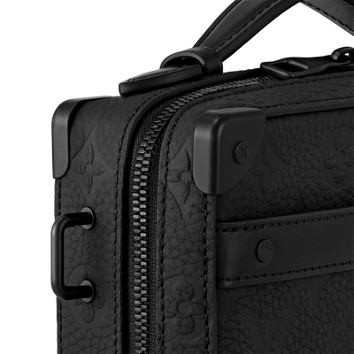 Bolso con asa de baúl suave