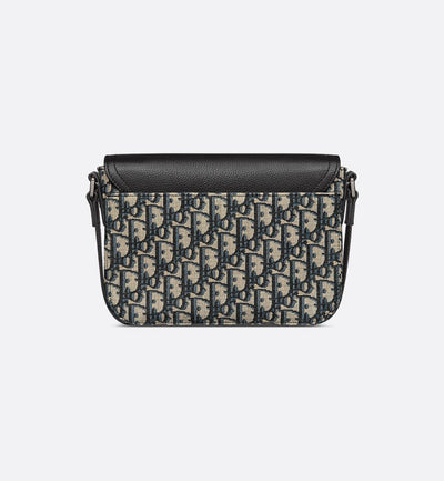 Bolso bandolera pequeño con solapa en color negro y beige de Saddle