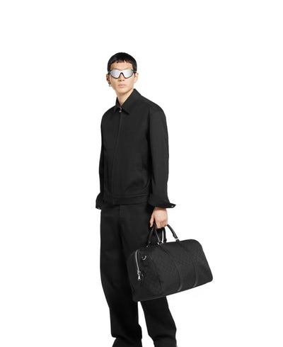 Bolsa de viaje mediana de lona GG