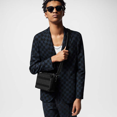 Bolso con asa de baúl suave