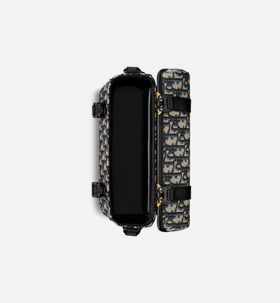 Bolso mensajero con solapa Hit The Road de Dior en negro y beige